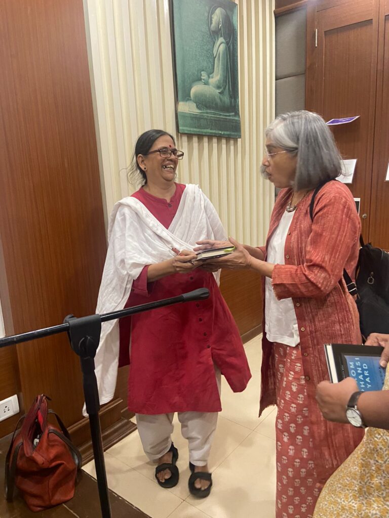 Actor Ratna Pathak Shah gets her signed copy from the author. 
